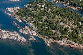 Telos Island, Snug Harbour Carling Township - Country homes for sale and luxury real estate including horse farms and property in the Caledon and King City areas near Toronto